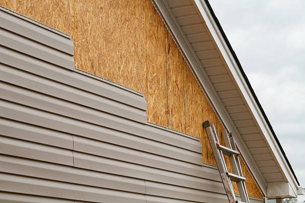 Professional Siding Installation technician working in Pinehurst, NC